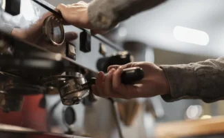 mini-close-up-hands-working-coffee-machine